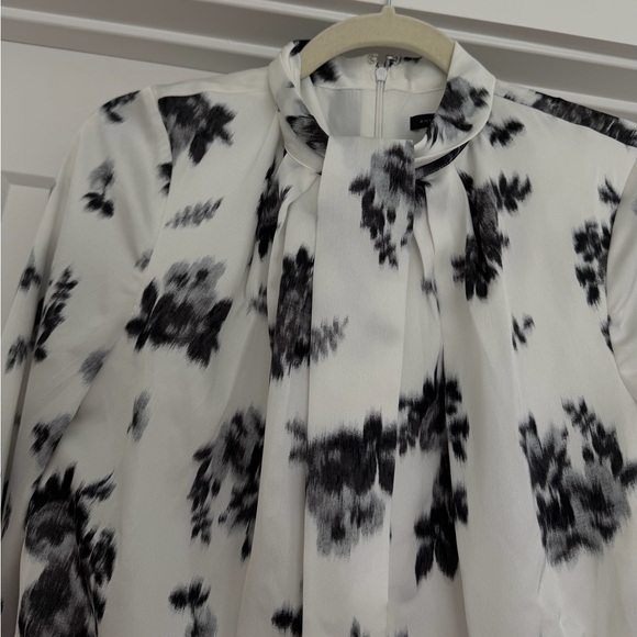 Ann Taylor’s Ikat Floral Mock Neck Flare Dress - Picture 7 of 9